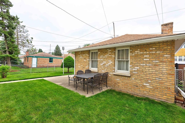 4934 N Marmora Ave, Chicago, IL 60630 - view of yard with a patio