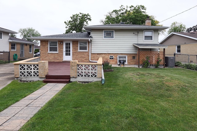 1065 Irwin Ave, Des Plaines, IL 60018 - back of house with brick siding, a chimney, and a deck