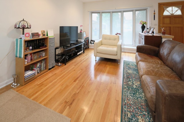 1065 Irwin Ave, Des Plaines, IL 60018 - living area featuring wood finished floors and baseboards