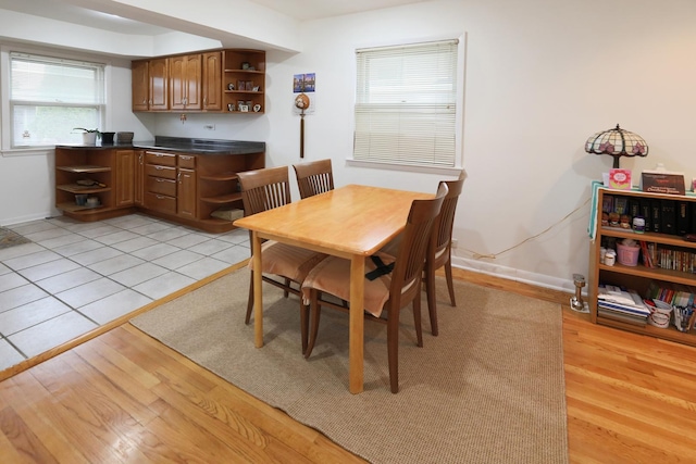 1065 Irwin Ave, Des Plaines, IL 60018 - dining area with light wood-style floors and baseboards