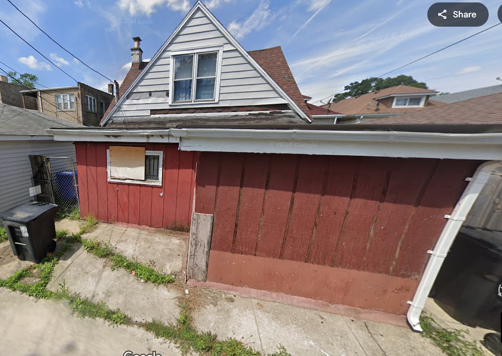 7239 S Maplewood Ave, Chicago, IL 60629 - view of home's exterior featuring board and batten siding