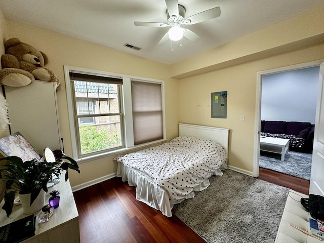 1366 W Greenleaf Ave Unit 3N, Chicago, IL 60626 - bedroom featuring electric panel, dark wood-style floors, and ceiling fan