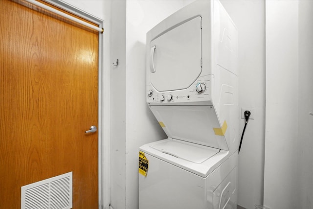 1503 S State St Unit 501, Chicago, IL 60605 - washroom featuring stacked washing machine and dryer