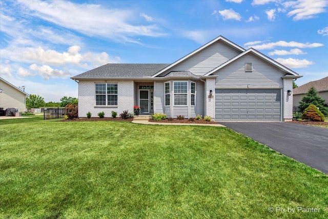 2213 Tyler Trl, Mchenry, IL 60051 - ranch-style home featuring asphalt driveway, a garage, and brick siding