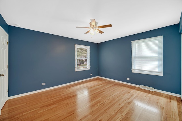 220 N Yates Ln, Mount Prospect, IL 60056 - spare room featuring a ceiling fan and wood finished floors