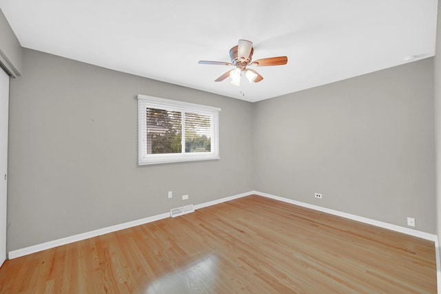 220 N Yates Ln, Mount Prospect, IL 60056 - empty room with wood finished floors and ceiling fan