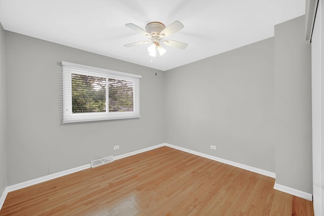 220 N Yates Ln, Mount Prospect, IL 60056 - empty room with light wood-style flooring and ceiling fan