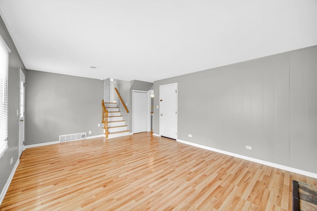 220 N Yates Ln, Mount Prospect, IL 60056 - unfurnished room featuring stairs and wood finished floors