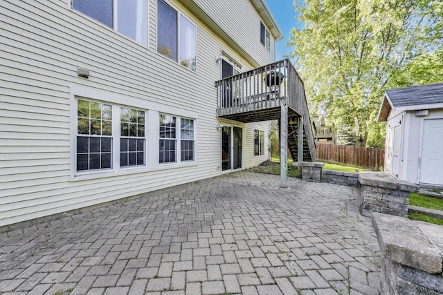34113 N Primrose Ct, Round Lake, IL 60073 - view of patio / terrace featuring stairway, a deck, and a shed