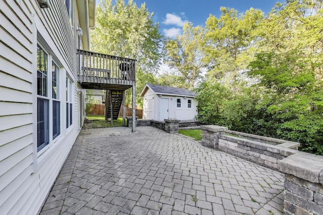 34113 N Primrose Ct, Round Lake, IL 60073 - view of patio / terrace with a storage shed, stairs, and a deck