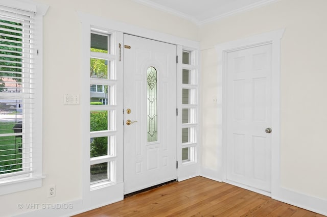 406 E Tower Dr, Tower Lakes, IL 60010 - entryway with wood finished floors, crown molding, and healthy amount of natural light