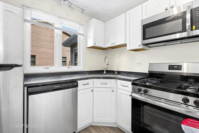 406 E Tower Dr, Tower Lakes, IL 60010 - kitchen featuring appliances with stainless steel finishes and white cabinetry