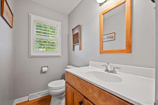 1009 E Bailey Rd, Naperville, IL 60565 - half bathroom with vanity and wood finished floors