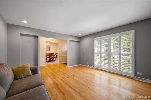 1009 E Bailey Rd, Naperville, IL 60565 - living area with light wood finished floors and recessed lighting