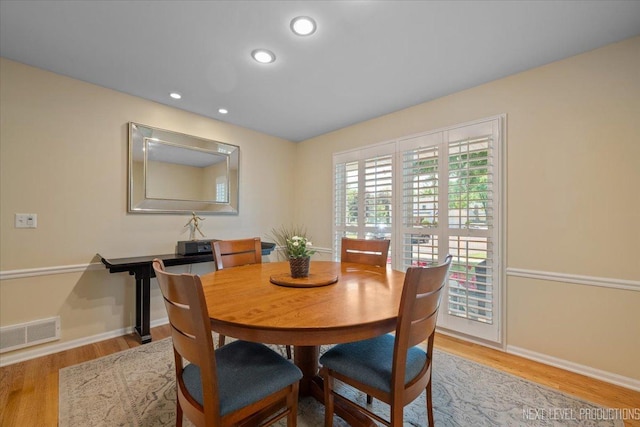 1009 E Bailey Rd, Naperville, IL 60565 - dining room with light wood-type flooring and recessed lighting