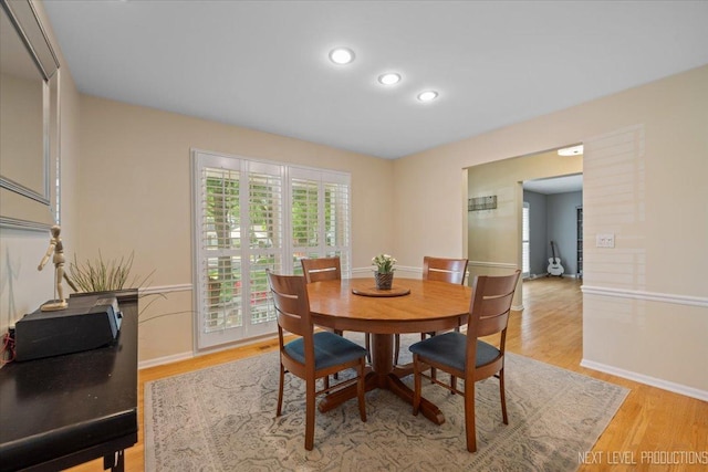 1009 E Bailey Rd, Naperville, IL 60565 - dining room with light wood-style floors and recessed lighting