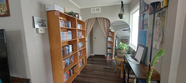 316 Clifton Dr, Round Lake Park, IL 60073 - sitting room featuring healthy amount of natural light, dark wood finished floors, ornamental molding, and arched walkways