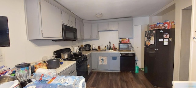 316 Clifton Dr, Round Lake Park, IL 60073 - kitchen with black appliances, gray cabinets, light countertops, and dark wood-type flooring