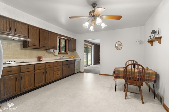 1458 Pleasant Dr, Crest Hill, IL 60403 - kitchen with dishwasher, light countertops, decorative backsplash, and a ceiling fan