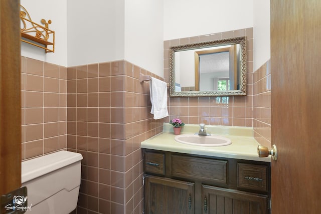 1458 Pleasant Dr, Crest Hill, IL 60403 - half bathroom featuring tile walls, vanity, and backsplash