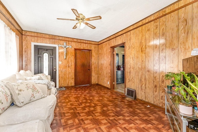 408 Summit St, Joliet, IL 60435 - living area featuring wooden walls and a ceiling fan