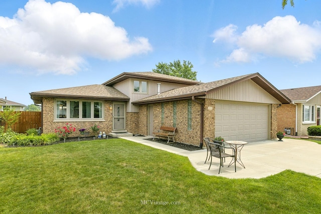16821 89th Ave, Orland Hills, IL 60487 - split level home with a garage, brick siding, concrete driveway, and a shingled roof