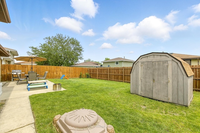 16821 89th Ave, Orland Hills, IL 60487 - fenced backyard with a storage shed and a patio area