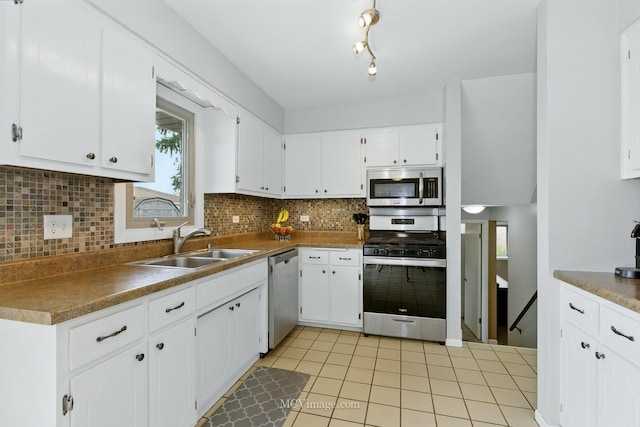 16821 89th Ave, Orland Hills, IL 60487 - kitchen featuring stainless steel appliances, white cabinetry, light tile patterned flooring, and decorative backsplash