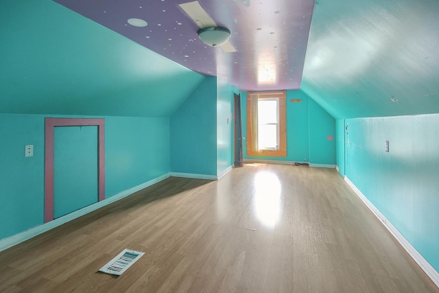 10445 S S Ave H, Chicago, IL 60617 - additional living space featuring wood finished floors and lofted ceiling