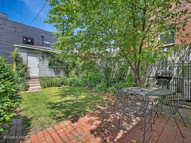 1754 W Cortland St, Chicago, IL 60622 - view of grassy yard featuring a patio and outdoor dining space