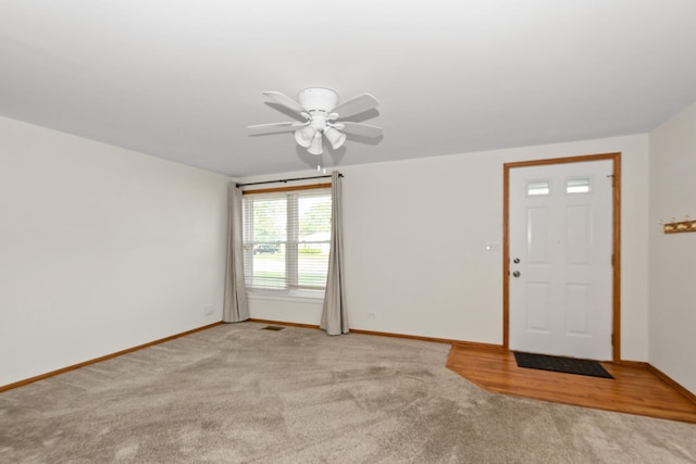 8928 S Ryan Rd, Hometown, IL 60456 - carpeted foyer entrance featuring ceiling fan and baseboards