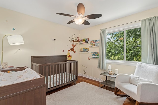 17889 W Elsbury St, Gurnee, IL 60031 - bedroom featuring wood finished floors and a nursery area