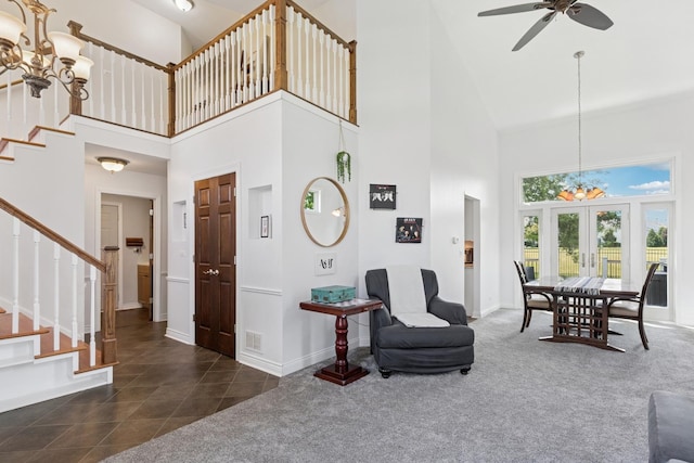 17889 W Elsbury St, Gurnee, IL 60031 - tiled foyer featuring high vaulted ceiling, a chandelier, stairs, ceiling fan, and carpet flooring