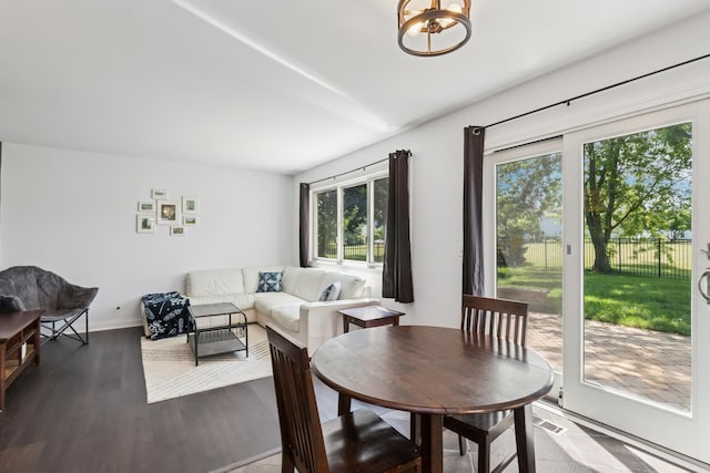 17889 W Elsbury St, Gurnee, IL 60031 - dining space featuring wood finished floors and a chandelier