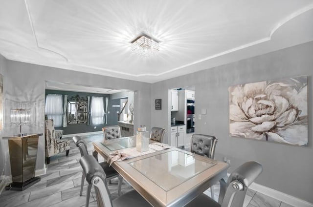3105 Hermes Dr, Olympia Fields, IL 60461 - dining area with baseboards and light marble finish flooring