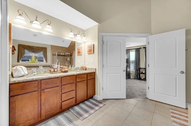 3105 Hermes Dr, Olympia Fields, IL 60461 - bathroom featuring double vanity, tile patterned floors, a shower with shower door, and vaulted ceiling
