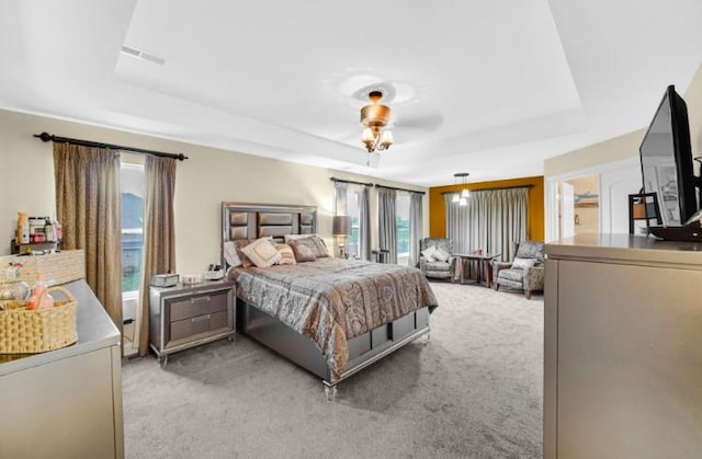 3105 Hermes Dr, Olympia Fields, IL 60461 - bedroom featuring a tray ceiling, light colored carpet, and access to exterior