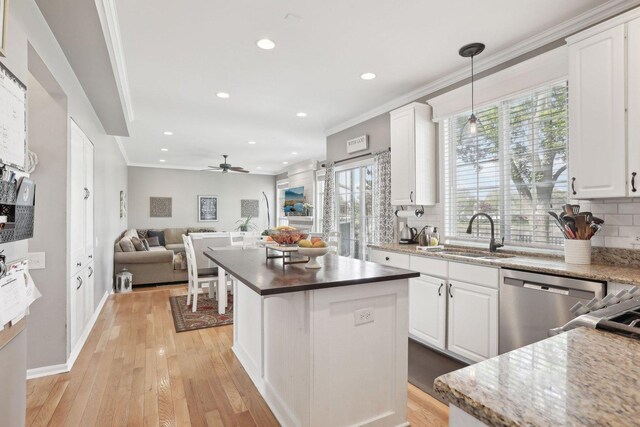 220 Carters Grove Ct, Grayslake, IL 60030 - kitchen with stainless steel dishwasher, tasteful backsplash, a kitchen island, recessed lighting, and open floor plan