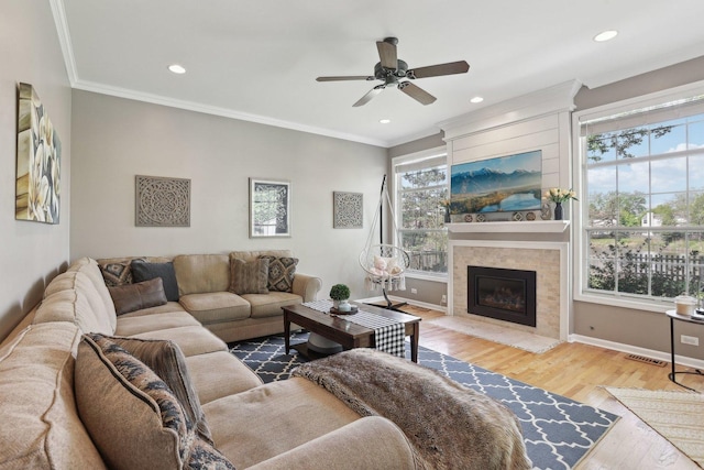 220 Carters Grove Ct, Grayslake, IL 60030 - living area with ceiling fan, wood finished floors, a fireplace, ornamental molding, and recessed lighting