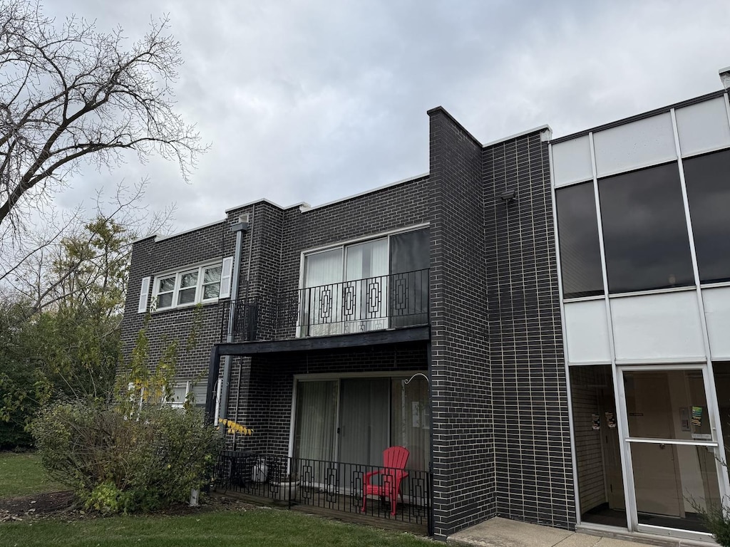 18330 Cherry Creek Dr Unit 5, Homewood, IL 60430 - rear view of house featuring a balcony and brick siding