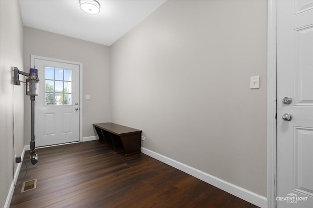 1133 Daytona Way, Pingree Grove, IL 60140 - doorway to outside featuring dark wood-type flooring and baseboards