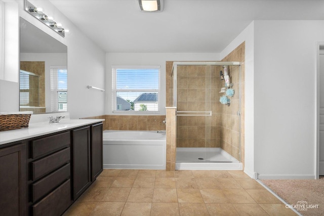 1133 Daytona Way, Pingree Grove, IL 60140 - full bathroom featuring vanity, a shower stall, a garden tub, and tile patterned floors