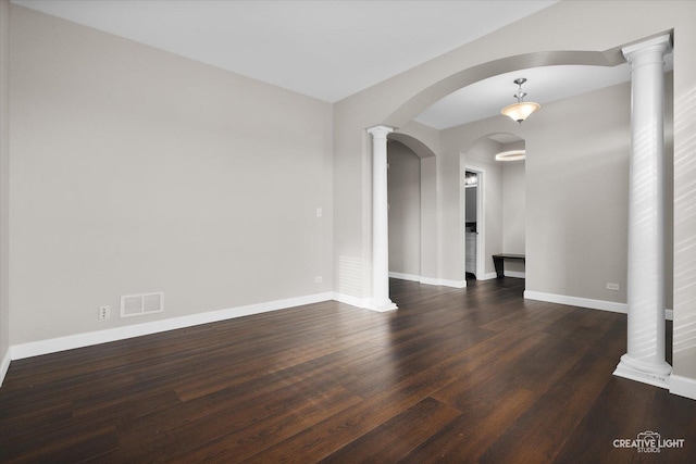 1133 Daytona Way, Pingree Grove, IL 60140 - empty room featuring wood finished floors, arched walkways, and decorative columns