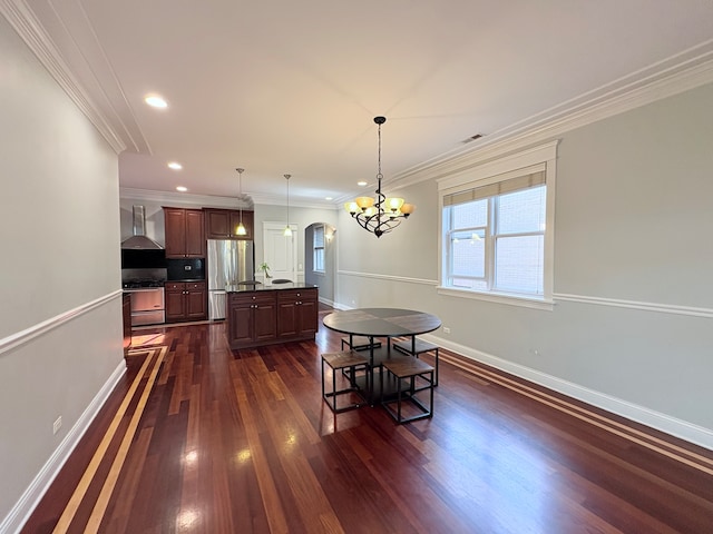 818 W Aldine Ave Unit 3, Chicago, IL 60657 - dining area featuring a chandelier, dark wood finished floors, ornamental molding, recessed lighting, and arched walkways