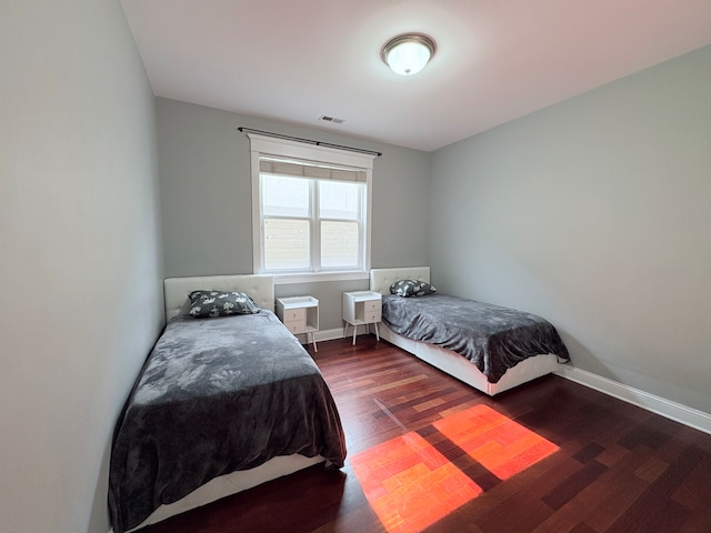 818 W Aldine Ave Unit 3, Chicago, IL 60657 - bedroom featuring wood finished floors and baseboards