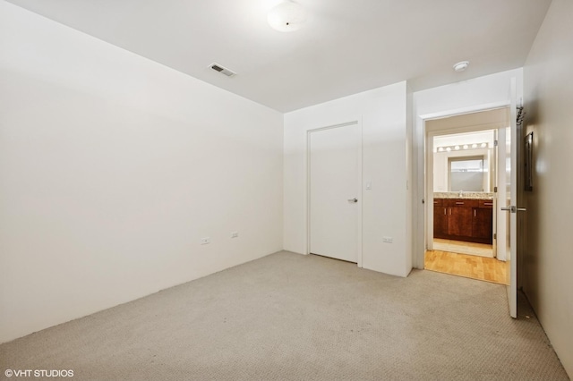 1740 Oak Ave Unit 103, Evanston, IL 60201 - unfurnished bedroom with light colored carpet