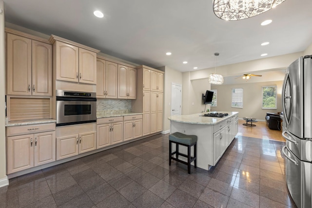 2308 Fleetwood Ct, Naperville, IL 60565 - kitchen featuring appliances with stainless steel finishes, a center island, granite tiled floors, recessed lighting, and tasteful backsplash