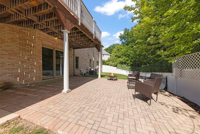 2308 Fleetwood Ct, Naperville, IL 60565 - fenced backyard with a patio area and an outdoor living space with a fire pit