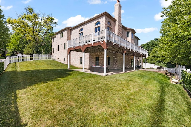 2308 Fleetwood Ct, Naperville, IL 60565 - back of house featuring a patio area, a fenced backyard, a chimney, a deck, and brick siding