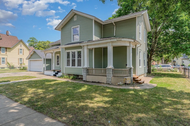 528 E Benton St, Aurora, IL 60505 - view of front facade featuring covered porch, an outdoor structure, a garage, and driveway